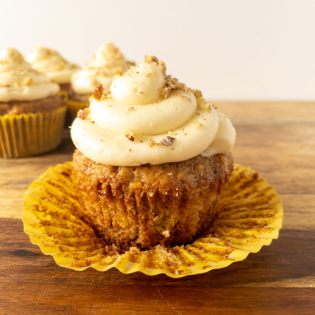 pineapple pecan cupcake with wrapper pulled down