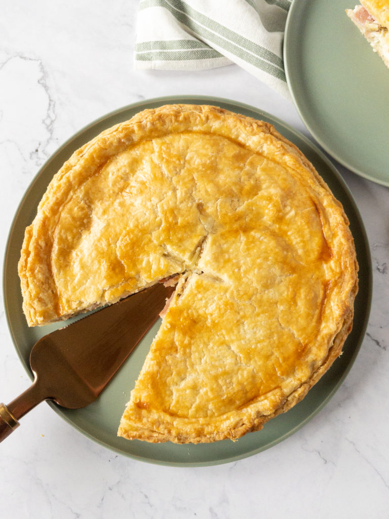 cooked pie with slice removed
