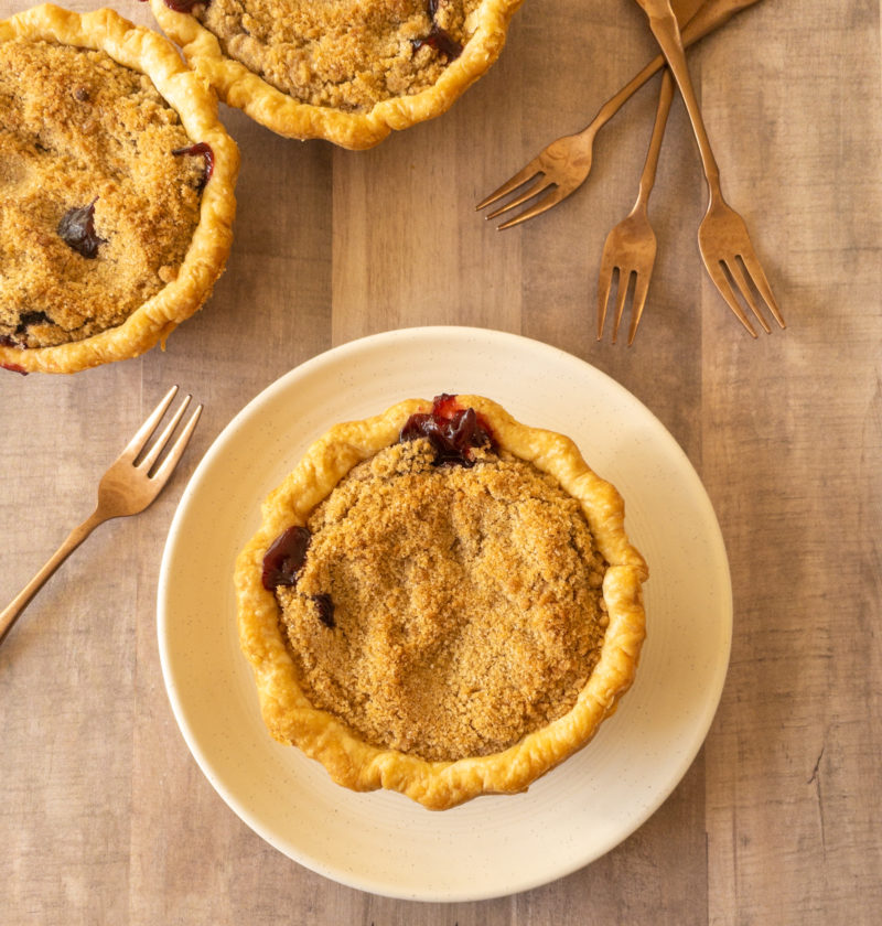 Three cherry pies with streusel topping