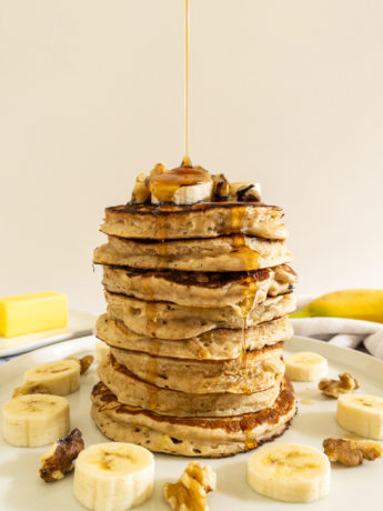 Stack of banana pancakes on plate