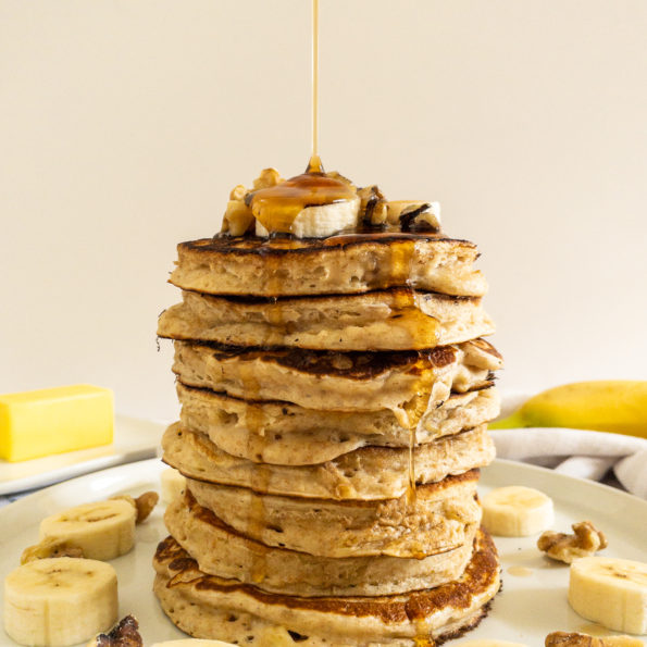 Stack of banana pancakes on plate