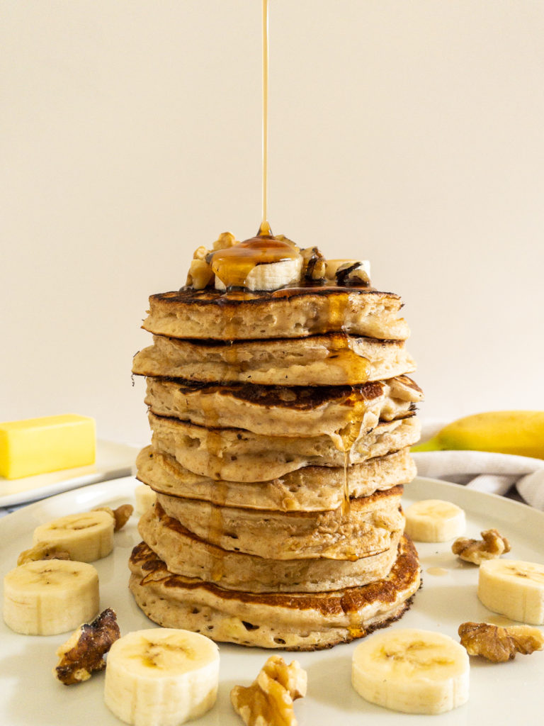 Stack of banana pancakes on plate